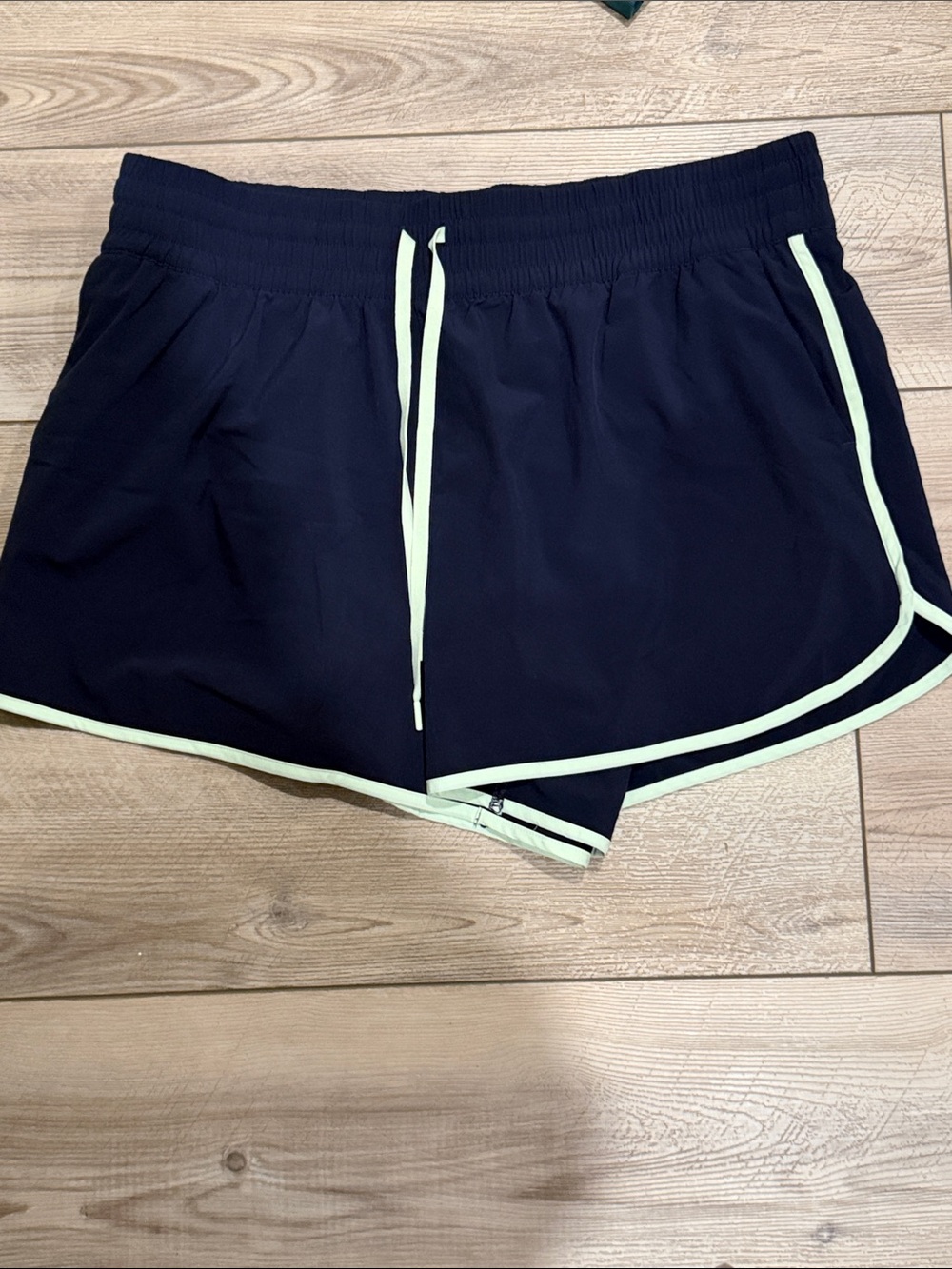 Athleta Women’s Navy Athletic Shorts with Mint Trim